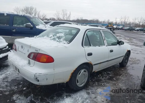 1999 Toyota Corolla Ce из США, поврежденный, VIN 1NXBR12E5XZ150357